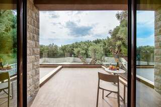 Апартаменты Adria lux apartmens 2 Свети-Стефан Апартаменты с 2 спальнями, террасой и видом на сад-9